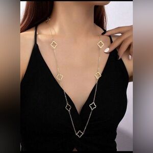 New hollow long clover necklace in yellow gold